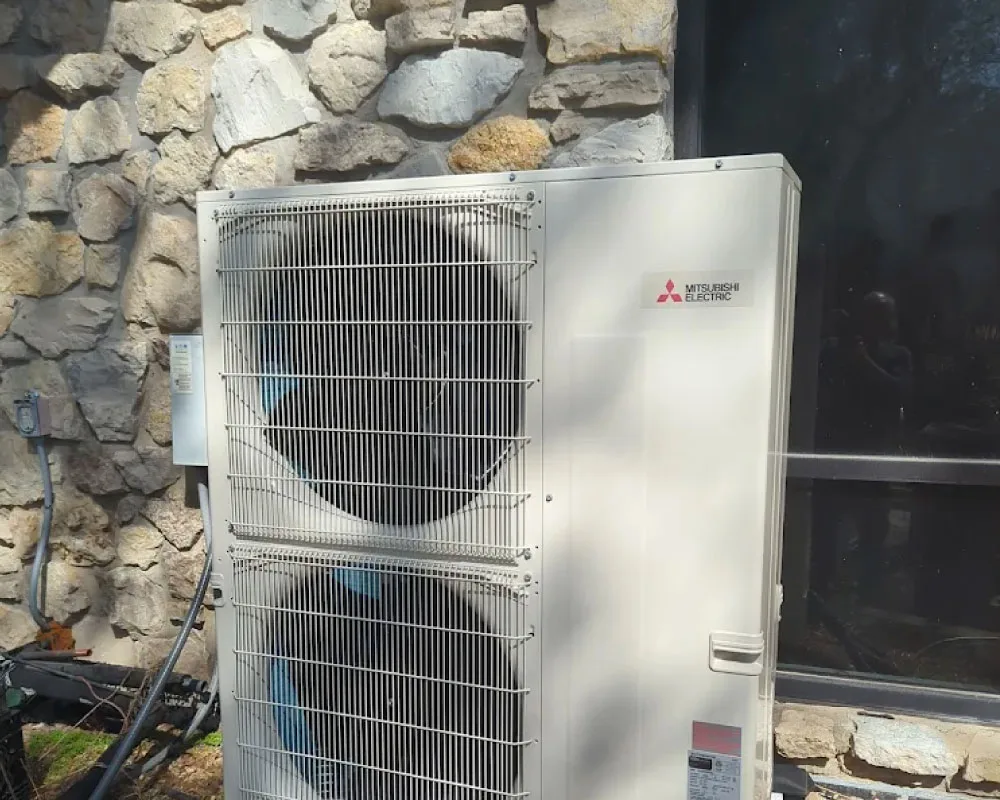 Ductless mini-split indoor head unit mounted on a wall in a Branson home