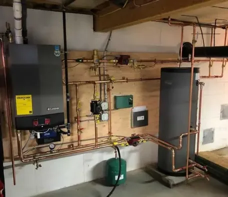 Lochinvar high-efficiency boiler installed with copper piping in a Branson-area home